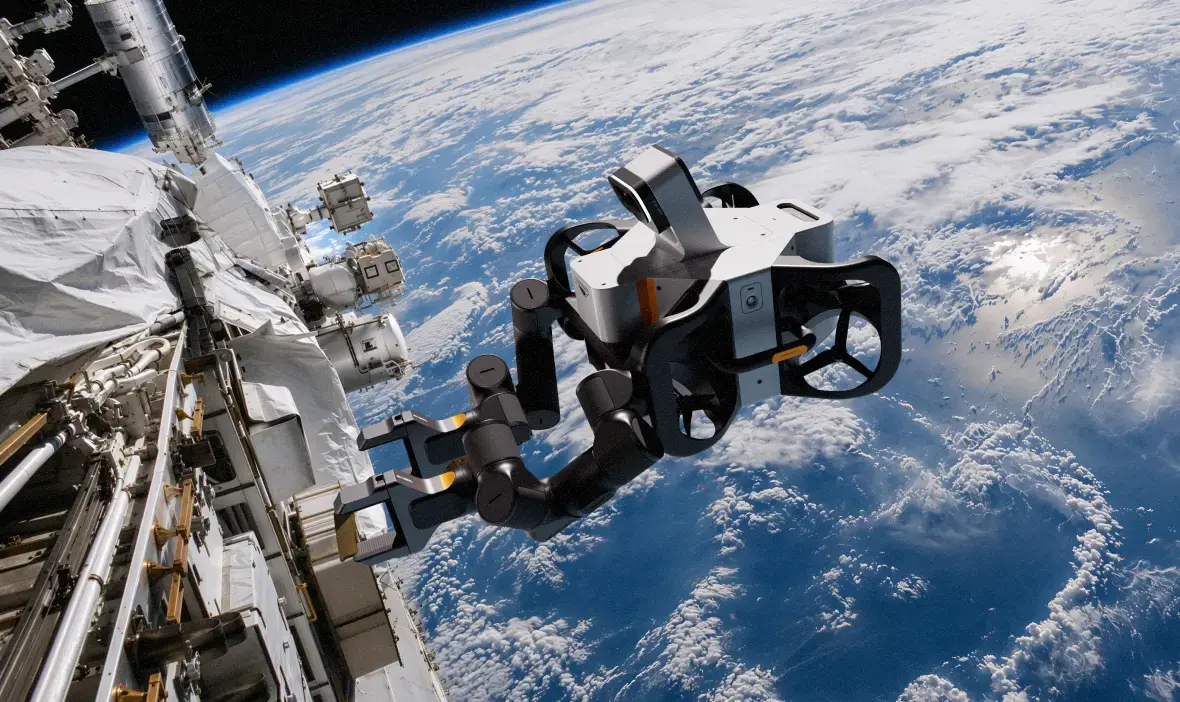 Robotic arm performing maintenance on station hardware